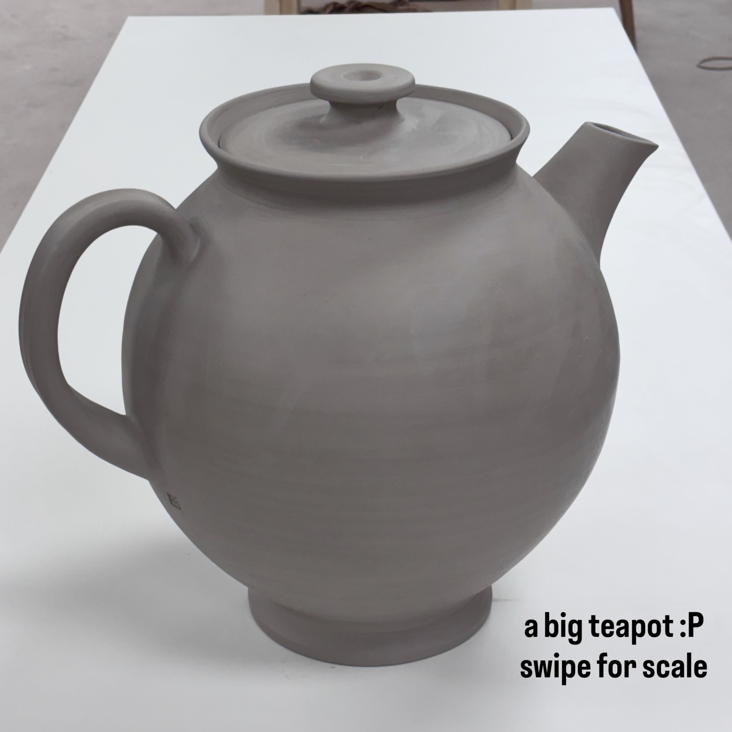 i made a big teapot. threw a big pot and had no real plan.  looked like a good teapot shape lol.  anyone need a 13 litre teapot? taking guesses for how much it will fit.